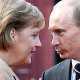Меркель отказалась здороваться с Януковичем за руку на саммите НАТО