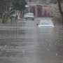 В Евпатории в размытых дождем улицах увязли две машины