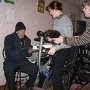 Пережить морозы и гололед ветеранам и инвалидам Красногвардейского района помогают соцработники