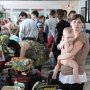 ФОТО. Жестокое лето Донбасса гонит его жителей в Крым