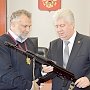 Главе Заксобрания Севастополя вручили орден и копию автомата