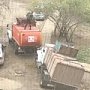 В Керчи мусоровоз застрял в оставленной коммунальными службами яме