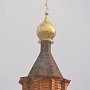 Накупольный крест часовни освятили в Белогорске