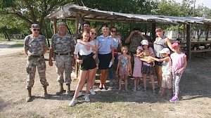 Севастопольские полицейские организовали для подшефных детей поездку к казакам «Севастопольской пластунской сотни»