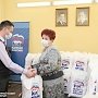 Депутаты крымского парламента из фракции «Единая Россия» передали волонтерскому центру продуктовые наборы для нуждающихся крымчан